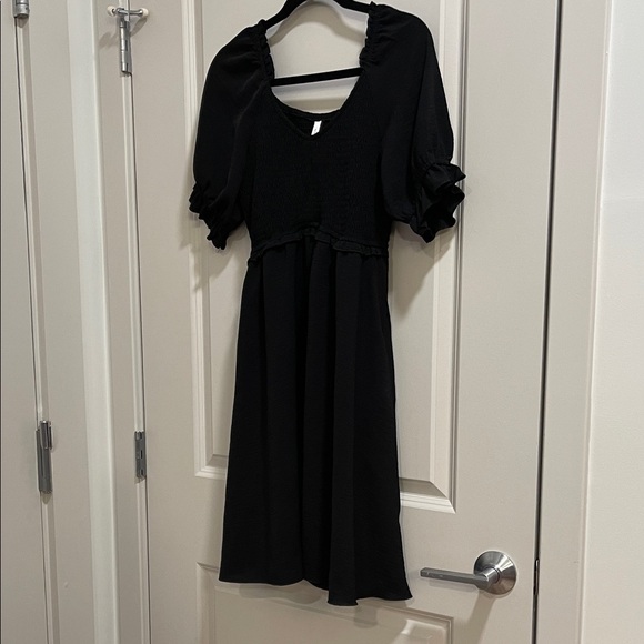 Dokotoo Dresses & Skirts - Chic Black Midi Dress with Ruffled Sleeves
